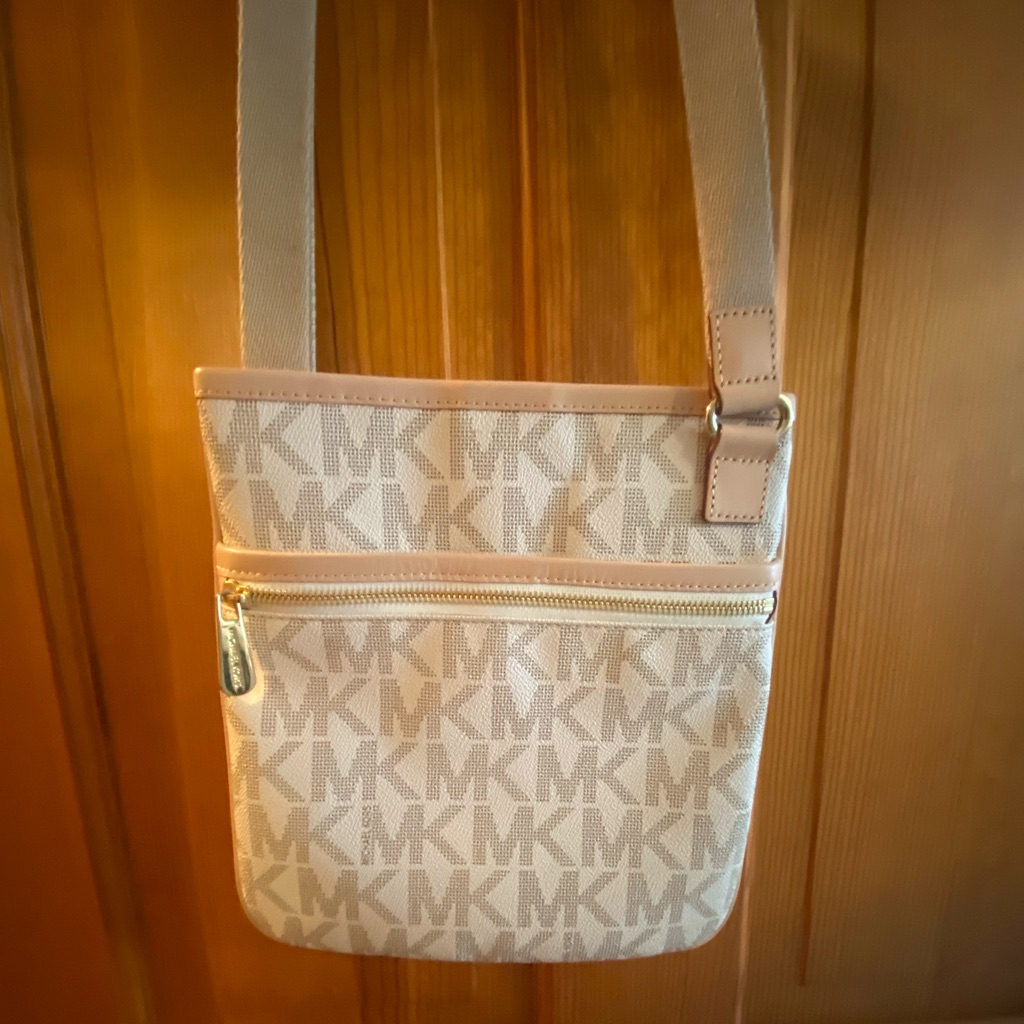 New With Tags: Michael Kors Flat Crossbody Bag. Never Used